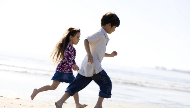 Happy childrens on beach